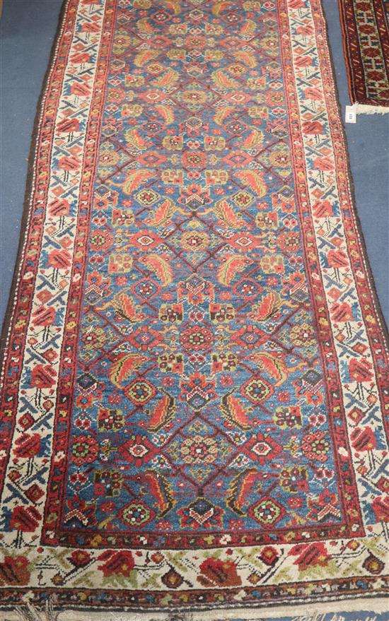 An early 20th century Caucasian blue ground runner- 5m x 1m